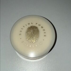 Guerlain Cream Dusting Powder in the Shalimar scent with Gold Detail.